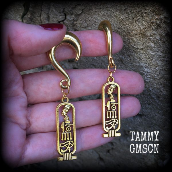 Cartouche gauged earrings For Sale