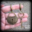 Antique bronze padlock and key hoop earrings-Tunnel hoops on Sale