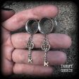 Antique silver key tunnel earrings on Sale