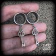 Antique silver key tunnel earrings on Sale