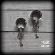 Antique silver key tunnel earrings on Sale