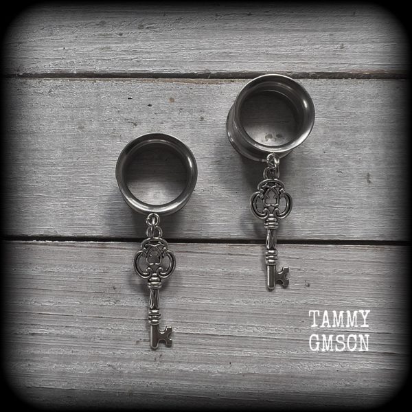 Antique silver key tunnel earrings on Sale