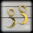 Antique gold crescent moon gauged hoop earrings on Sale