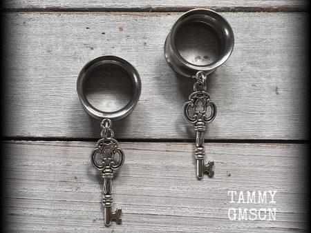 Antique silver key tunnel earrings on Sale