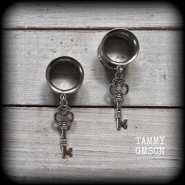 Antique silver key tunnel earrings on Sale