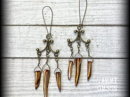 Antique bronze and shell tusk earrings Online