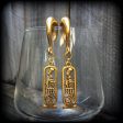 Cartouche gauged earrings For Sale