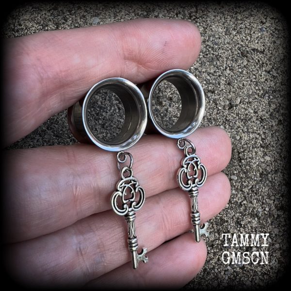 Antique silver key tunnel earrings on Sale